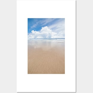 Waves sand beach and clouds sunny day Posters and Art